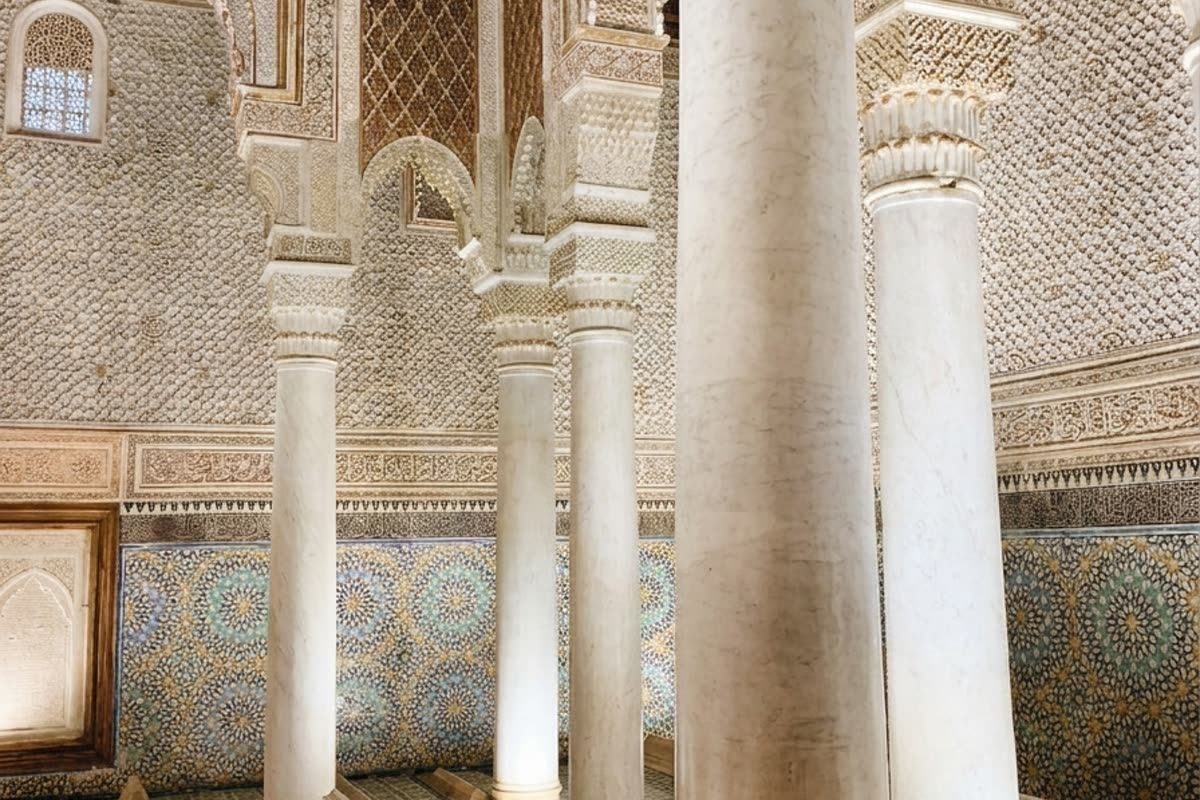 Carrara marble columns and zellige tilework in the Chamber of the Twelve Columns