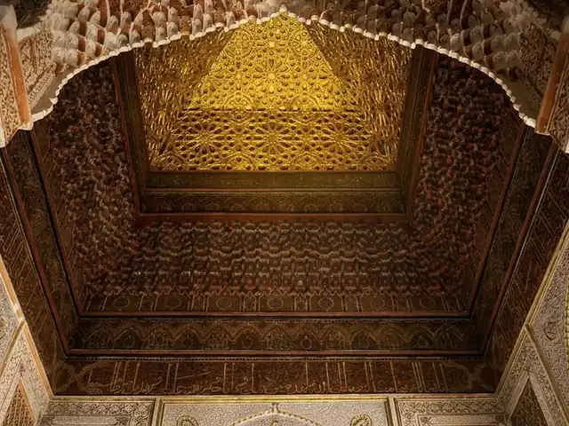 The gilded muqarnas ceiling above the central chamber