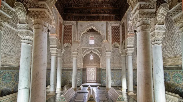 The full Chamber of the Twelve Columns, symmetrical, its marble columns rising to a carved cedar ceiling